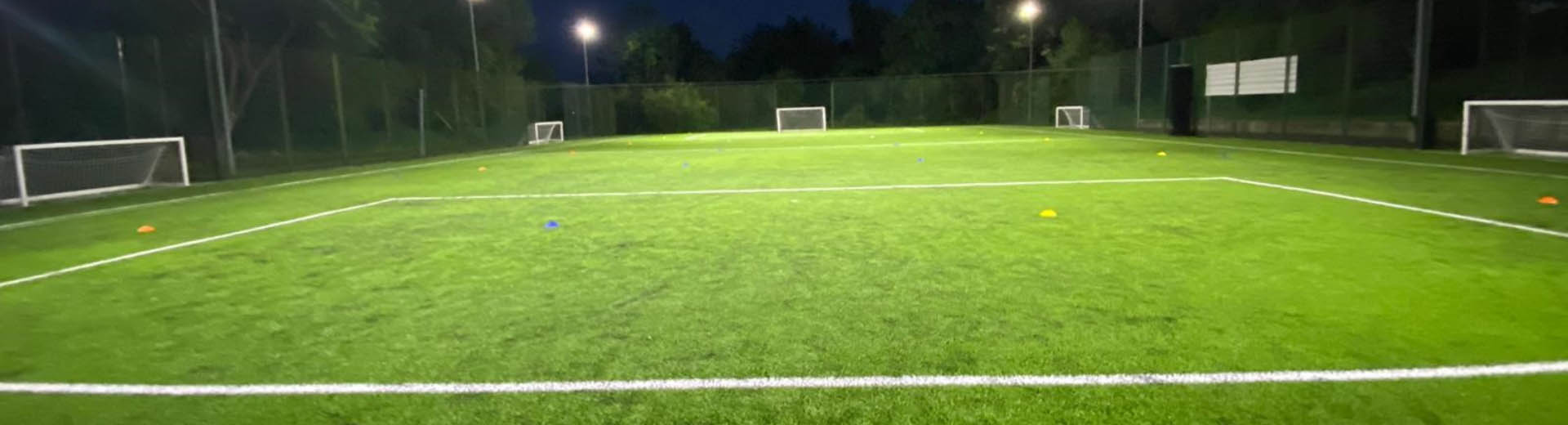 MUGA pitch illuminated by LED floodlights